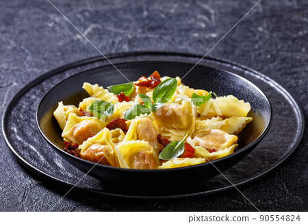 italian Tortelloni stuffed with sun dried tomatoes italian Tortelloni stuffed with sun dried tomatoes 90554824