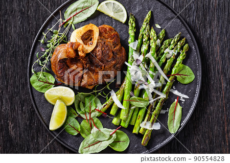 braised osso buco with grilled asparagus, top view braised osso buco with grilled asparagus, top view 90554828