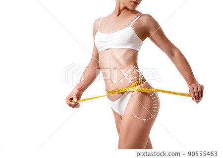 Female body with the drawing arrows on it isolated on white. Fat lose, liposuction and cellulite removal concept. 90555463