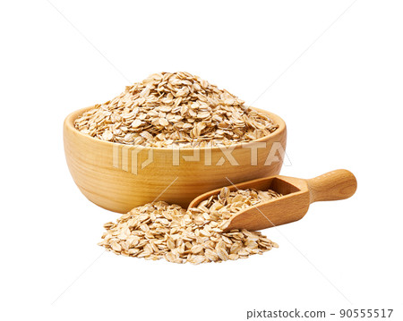 oatmeal flakes in wooden scoop and bowl isolated on white background. oatmeal flakes in wooden scoop and bowl isolated on white background. 90555517