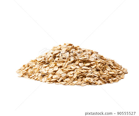 Pile of oatmeal flakes isolated on white background.Heap of dry oatmeal flakes isolated on white. Pile of oatmeal flakes isolated on white background.Heap of dry oatmeal flakes isolated on white. 90555527