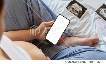 Pregnancy device mockups. Mobile pregnancy online maternity application. Pregnant mother using phone mock up. Pregnancy, medicine, pharmaceutics, health care and people concept. Pregnancy device mockups. Mobile pregnancy online maternity application. Pregnant mother using phone mock up. Pregnancy, medicine, pharmaceutics, health care and people concept. 90555610
