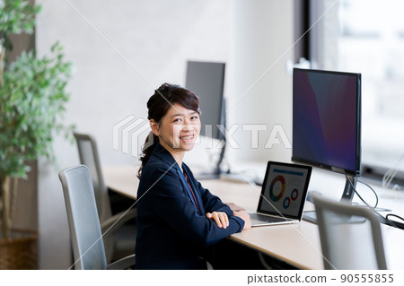 A woman working 90555855