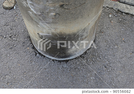 Telephone pole discolored by dog marking Telephone pole discolored by dog marking 90556082