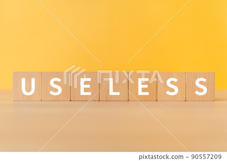 Image of useless | Block with "USELESS" written on it Image of useless | Block with "USELESS" written on it 90557209