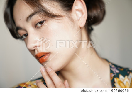 Up-style woman in a floral gown Up-style woman in a floral gown 90560086