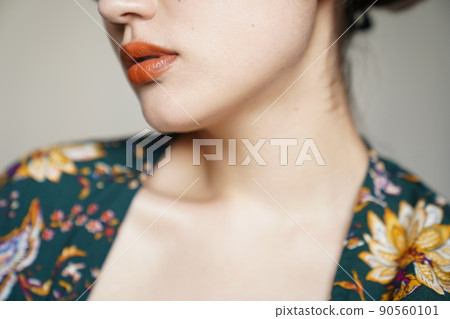 Up-style woman in a floral gown Up-style woman in a floral gown 90560101