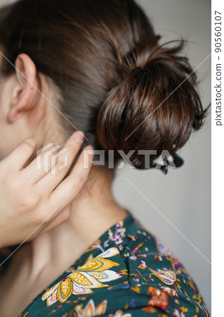 Up-style woman in a floral gown Up-style woman in a floral gown 90560107