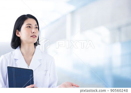 A lady in white 90560248