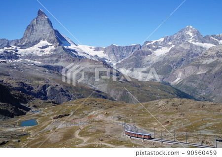 Swiss Alps Matterhorn and mountain railway Swiss Alps Matterhorn and mountain railway 90560459