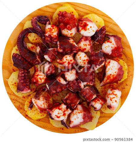 Chopped cooked octopus tentacles with smoked paprika and potato Chopped cooked octopus tentacles with smoked paprika and potato 90561384