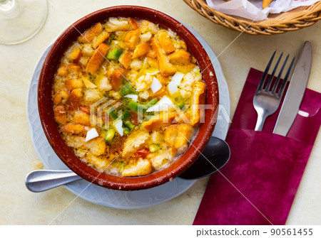 Traditional refreshing Extremadura dish Cojondongo from vegetables and bread in dressing 90561455