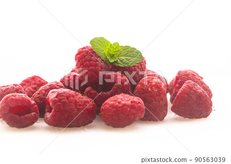 Fresh raspberries on white background 90563039