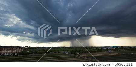 Overcast skies, heavy clouds gathered and violent storms rained in the distance that shook the gardeners' vegetable plots. Overcast skies, heavy clouds gathered and violent storms rained in the distance that shook the gardeners' vegetable plots. 90563181