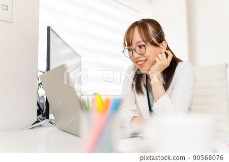 Young female engineer working from home Online conference Smile Young female engineer working from home Online conference Smile 90568076