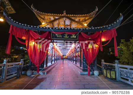 Furong Ancient Town illuminated at night. Amazing beautiful landscape scene of Furong Ancient Town (Furong Zhen, Hibiscus Town), China 90570286