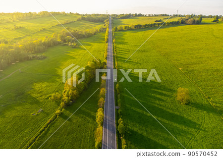 Straight asphalt road from above 90570452