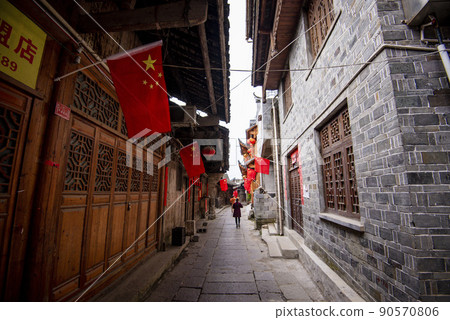Street view local in Furong Ancient Town (Furong Zhen, Hibiscus Town), China. Furong Ancient Town is famous tourism attraction place. Street view local in Furong Ancient Town (Furong Zhen, Hibiscus Town), China. Furong Ancient Town is famous tourism attraction place. 90570806
