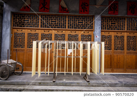 Street view local in Furong Ancient Town (Furong Zhen, Hibiscus Town), China. Furong Ancient Town is famous tourism attraction place. 90570820