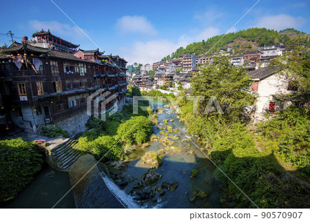 Street view local in Furong Ancient Town (Furong Zhen, Hibiscus Town), China. Furong Ancient Town is famous tourism attraction place. 90570907