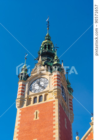 Gdansk Glowny is the historic exterior of main railway station with clock tower, Poland Gdansk Glowny is the historic exterior of main railway station with clock tower, Poland 90571657