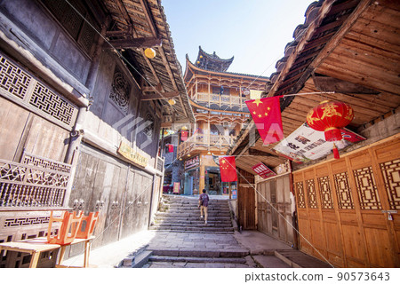Street view local in Furong Ancient Town (Furong Zhen, Hibiscus Town), China. Furong Ancient Town is famous tourism attraction place. 90573643
