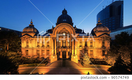 Aerial drone view of the CEC Palace at night in Bucharest, Romania Aerial drone view of the CEC Palace at night in Bucharest, Romania 90574749