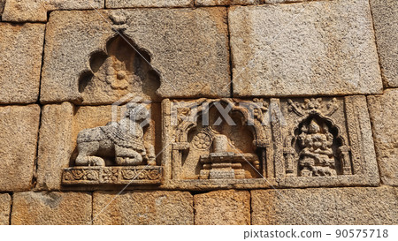 Carved sculpture of Shivalinga and Nandi on the wall of Chitradurga fort, Karnataka, India Carved sculpture of Shivalinga and Nandi on the wall of Chitradurga fort, Karnataka, India 90575718