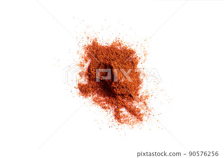 Crushed red pepper chilli pile from top on white background Crushed red pepper chilli pile from top on white background 90576256