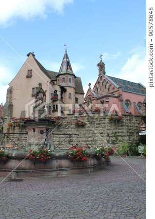 Stained glass in Eguisheim, France 90578648