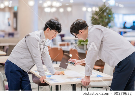 Engineers discussing construction plans 90579652