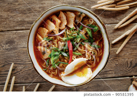 Bowl of asian ramen noodle soup 90581395