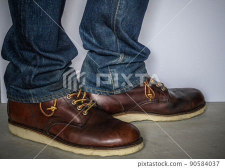 Wearing work boots and denim 90584037