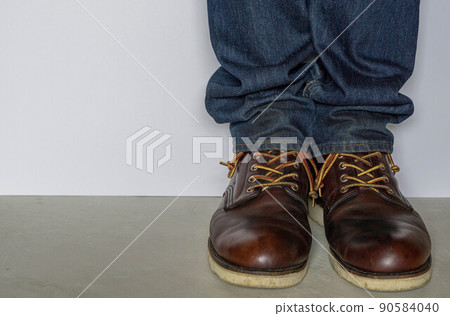 Wearing work boots and denim 90584040