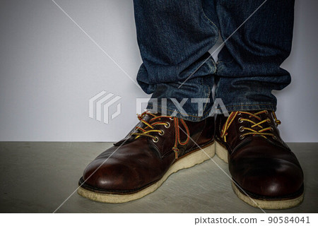 Wearing work boots and denim 90584041
