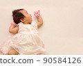 Baby looks at the blank space top view on white background 90584126