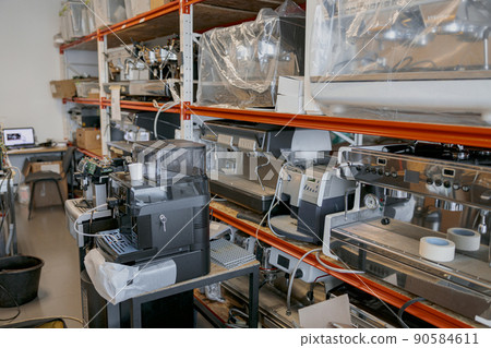 Warehouse with coffee machines ready to work Warehouse with coffee machines ready to work 90584611