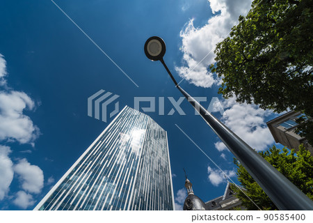 Saint - Josse, Brussels Capital Region - Belgium - View of the Astro tower with blue sky, with the Actiris and VDAB job offices Saint - Josse, Brussels Capital Region - Belgium - View of the Astro tower with blue sky, with the Actiris and VDAB job offices 90585400
