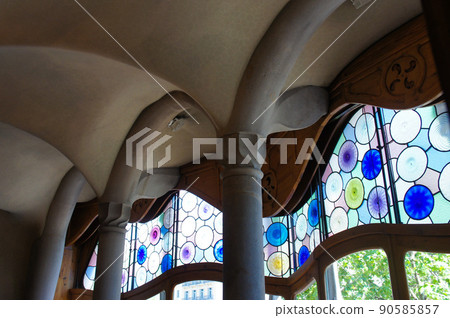 Casa Batllo window with colored glass polka dots Casa Batllo window with colored glass polka dots 90585857