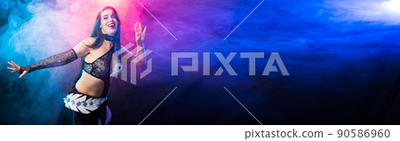 Banner spirituality dance. Beautiful sexy woman with luxury glossy eastern make-up dancing tribal fusion with copy space. Belly dance. Banner spirituality dance. Beautiful sexy woman with luxury glossy eastern make-up dancing tribal fusion with copy space. Belly dance. 90586960