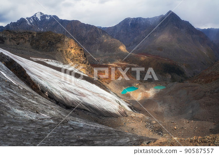 Nature background of dark glacier surface with cracks and scratc 90587557