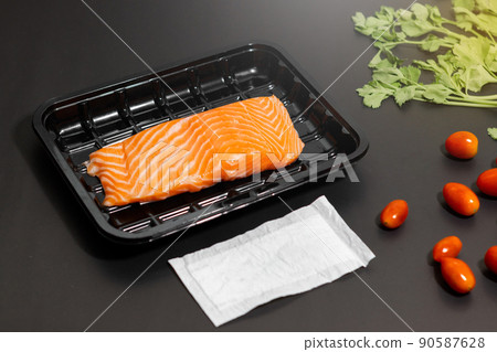 Salmon run stock on plastic packaging with food absorbent in supermarket, Good quality for food store 90587628