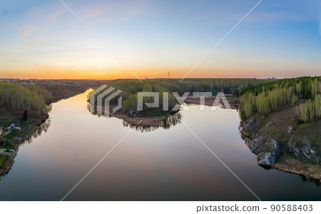 Confluence of the Iset and Kamenka rivers in the city Kamensk-Uralskiy. Iset and Kamenka rivers, Kamensk-Uralskiy, Sverdlovsk region, Ural mountains, Russia. Aerial view 90588403