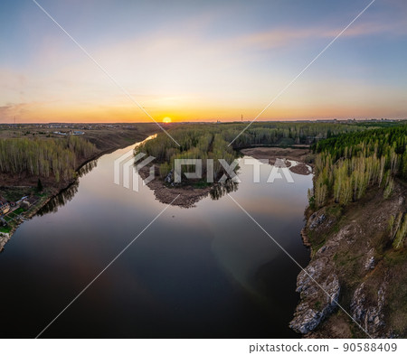 Confluence of the Iset and Kamenka rivers in the city Kamensk-Uralskiy. Iset and Kamenka rivers, Kamensk-Uralskiy, Sverdlovsk region, Ural mountains, Russia. Aerial view 90588409