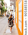 rear view of a latina woman walking in te historic center of Cartagena Colombia 90588558