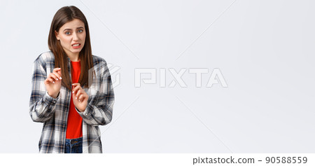 Lifestyle, different emotions, leisure activities concept. Ew gross. Girl touching something disgusting and step away with reluctant disgusted grimace, cringing from bad nasty smth, white background 90588559