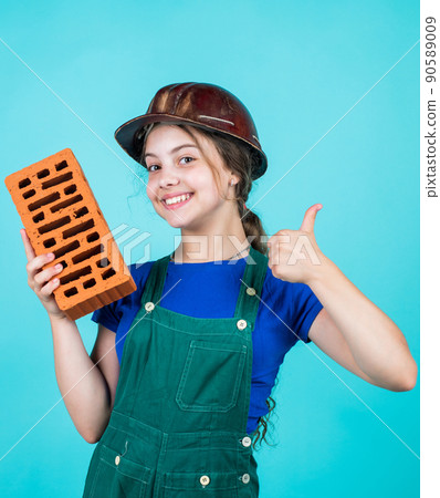 Build your future yourself. kid wear helmet on construction l carpenter Build your future yourself. kid wear helmet on construction l carpenter 90589009