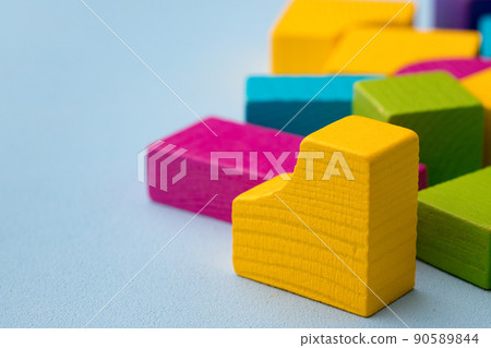 Wooden toy building kit details on blue background Wooden toy building kit details on blue background 90589844