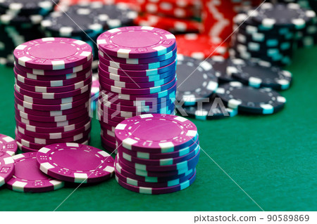 Stacks of playing chips on casino table Stacks of playing chips on casino table 90589869