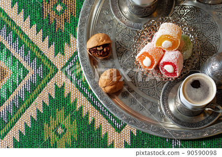 Turkish Coffee served with Turkish Delight on metal tray 90590098